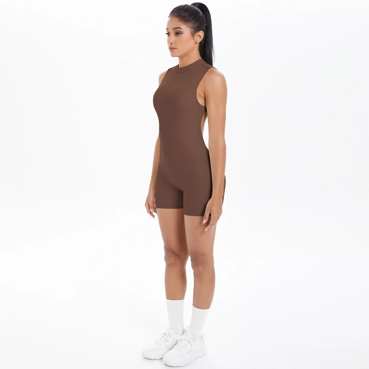 Xooie Fit backless active romper for women in brown with a sleek design for workouts