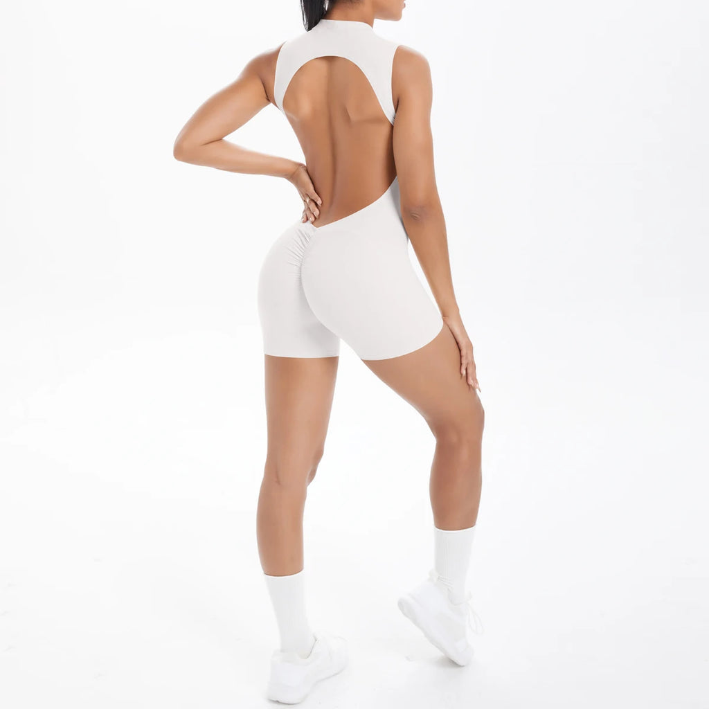 Xooie Fit backless active romper for women in beige, designed for style and comfort during workouts