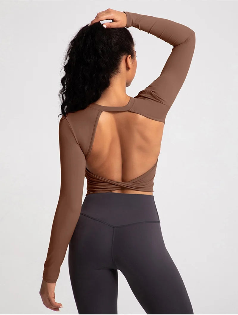 Xooie Fit backless long sleeve workout crop top in brown with a stylish open back design