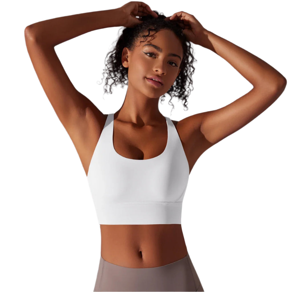Xooie Fit criss-cross back sports bra in white, designed for comfort and support during workouts