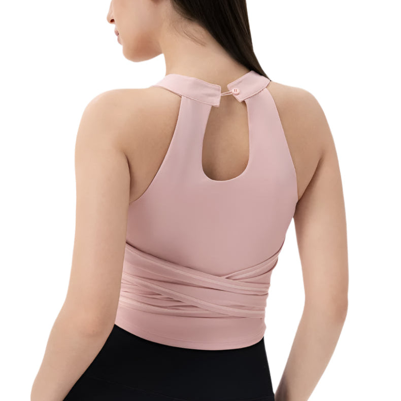Back view of Xooie Fit Fitted Workout Top for Women in soft pink with stylish crisscross design