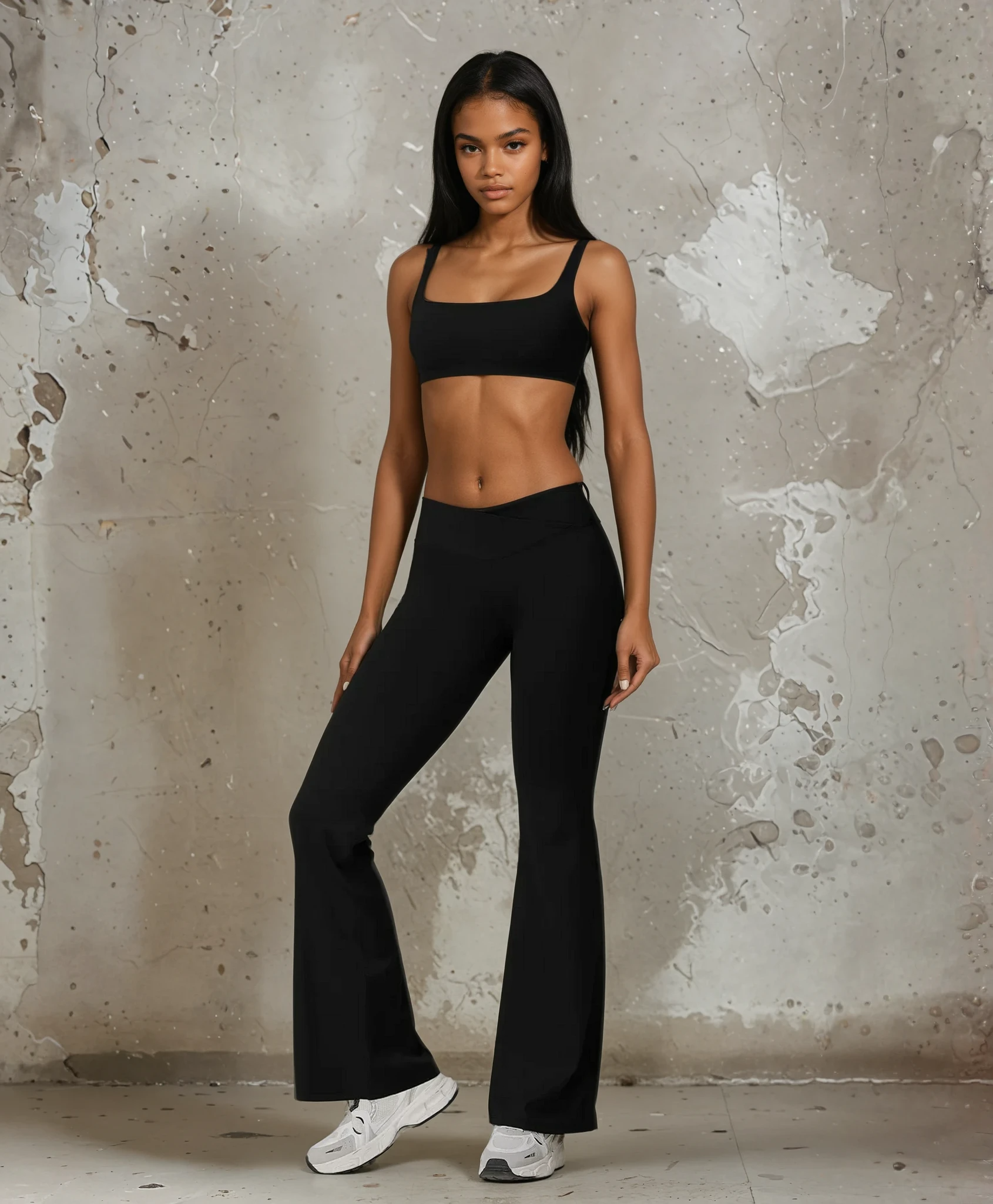 Black Xooie Fit flare pants and bra workout outfit for comfortable and stylish fitness attire