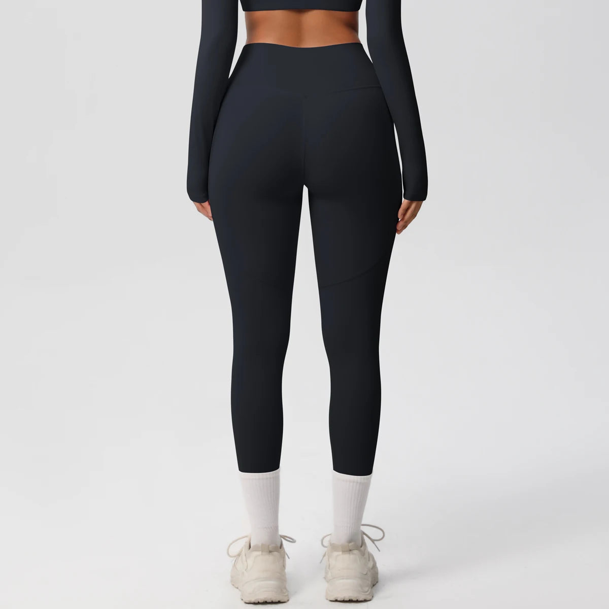 Xooie Fit High Intensity Pocket Leggings in black featuring a flattering fit and functional pockets