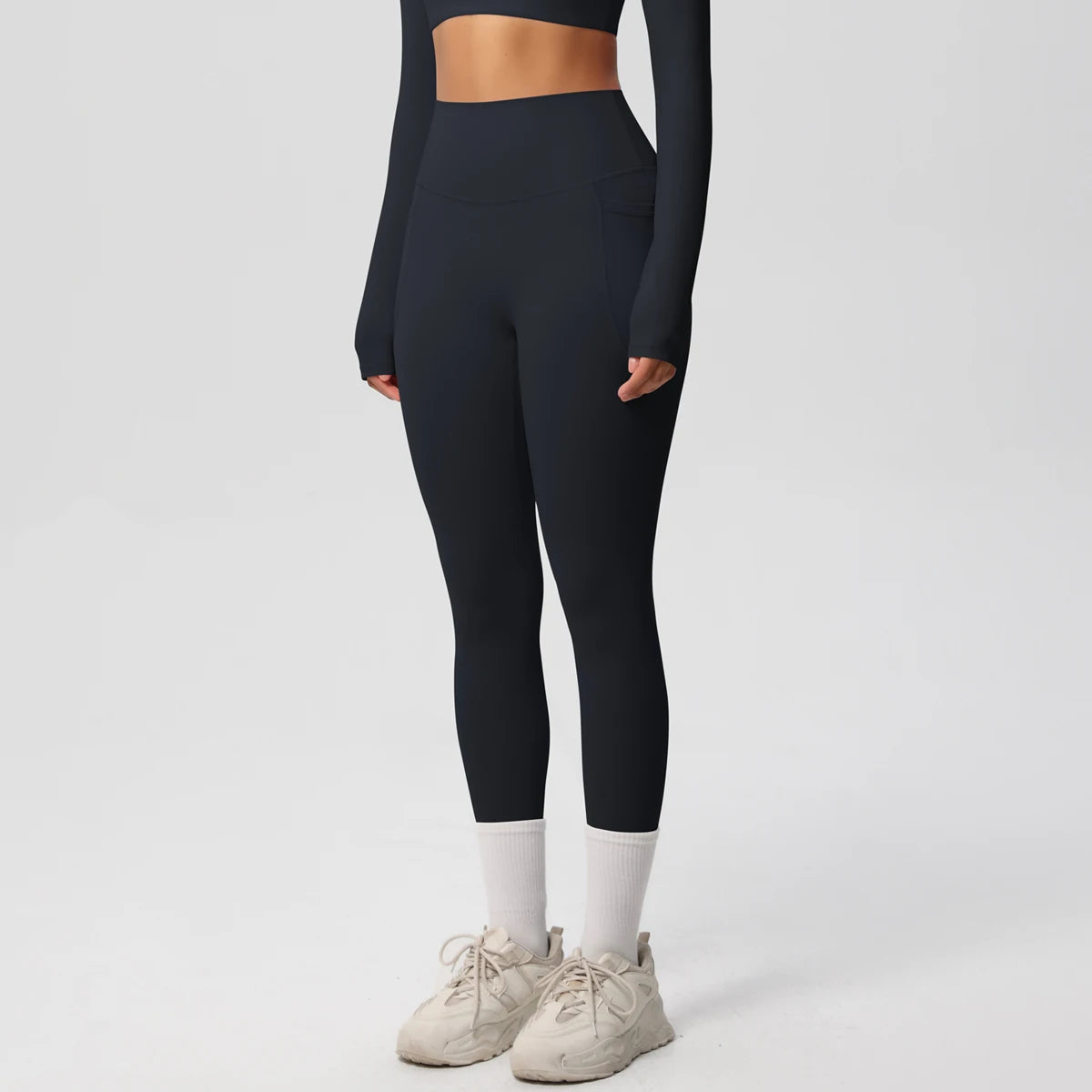 Xooie Fit high intensity pocket leggings in black for comfortable workouts with ample storage