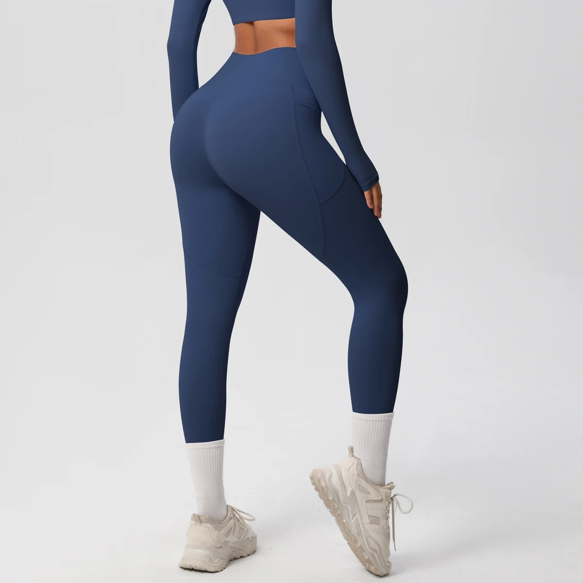 Xooie Fit High Intensity Pocket Leggings in navy blue with a form-fitting design for active workouts