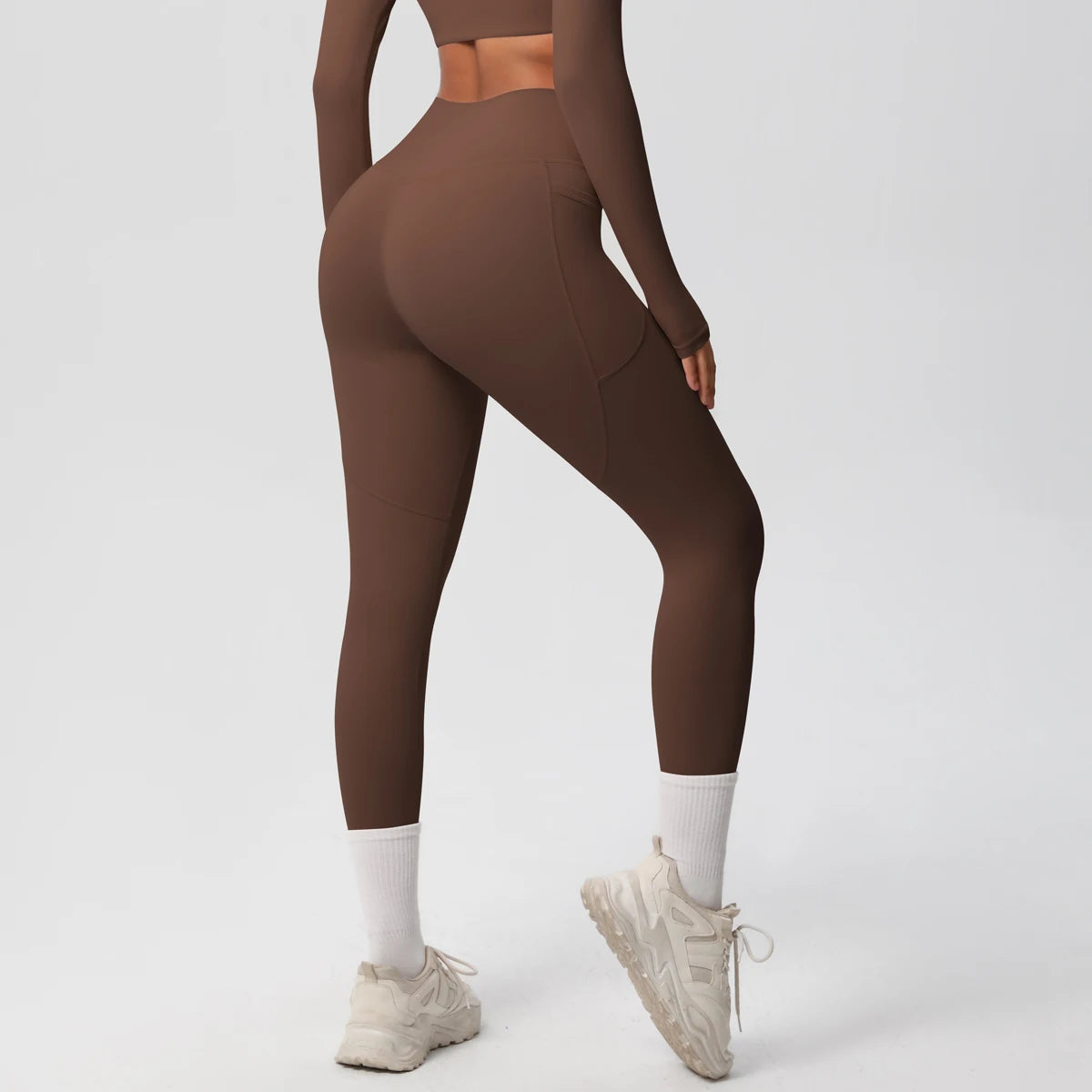 Xooie Fit high intensity pocket leggings in brown designed for comfort during workouts