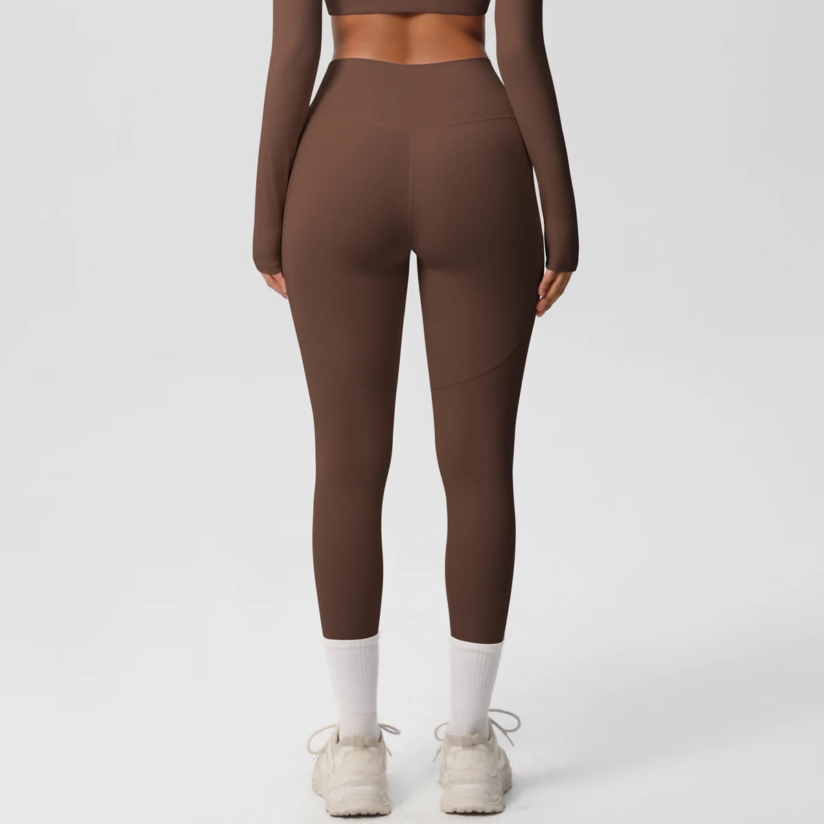 Xooie Fit high intensity pocket leggings in brown, perfect for active workouts and everyday wear