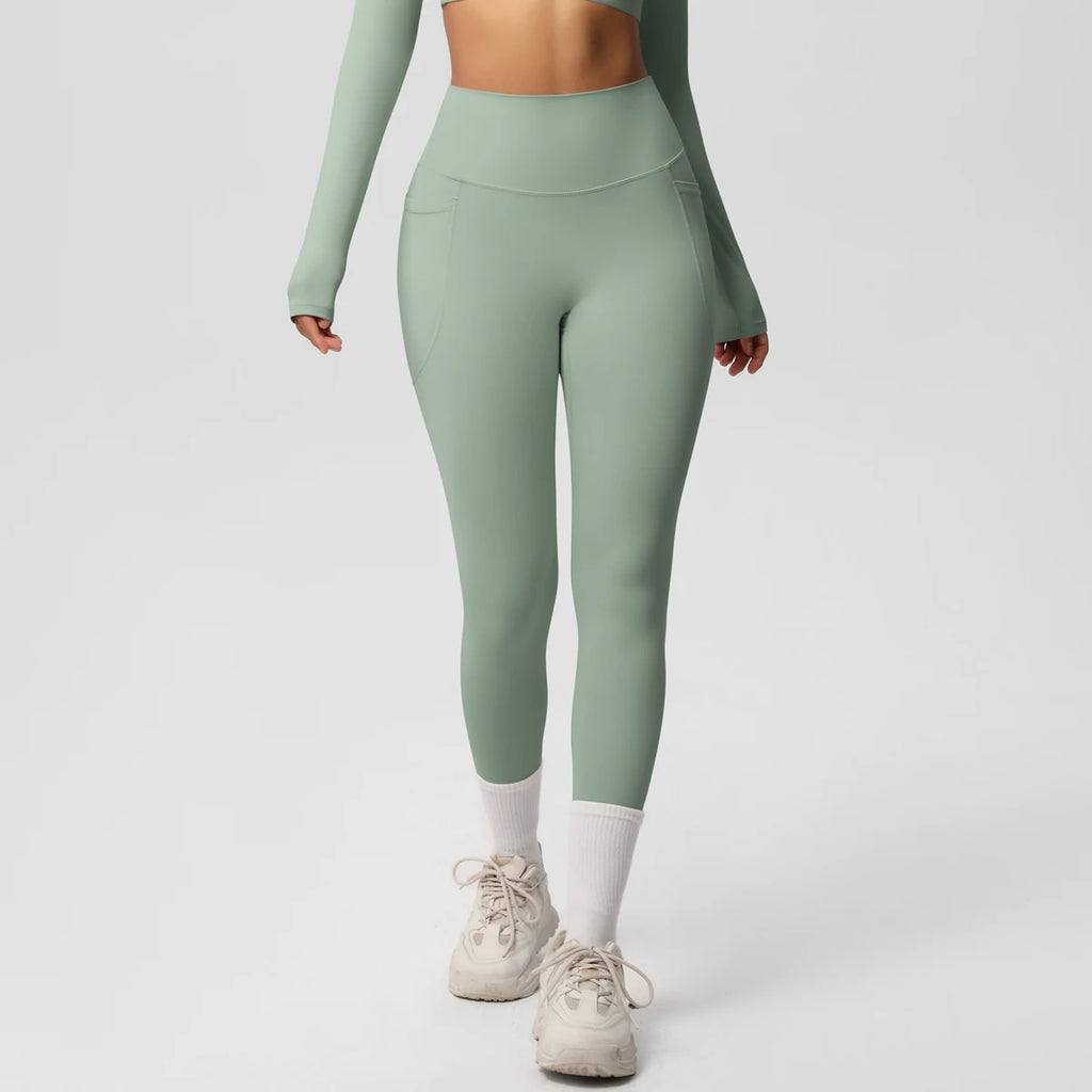 Xooie Fit high intensity pocket leggings in green for active workouts with secure pockets
