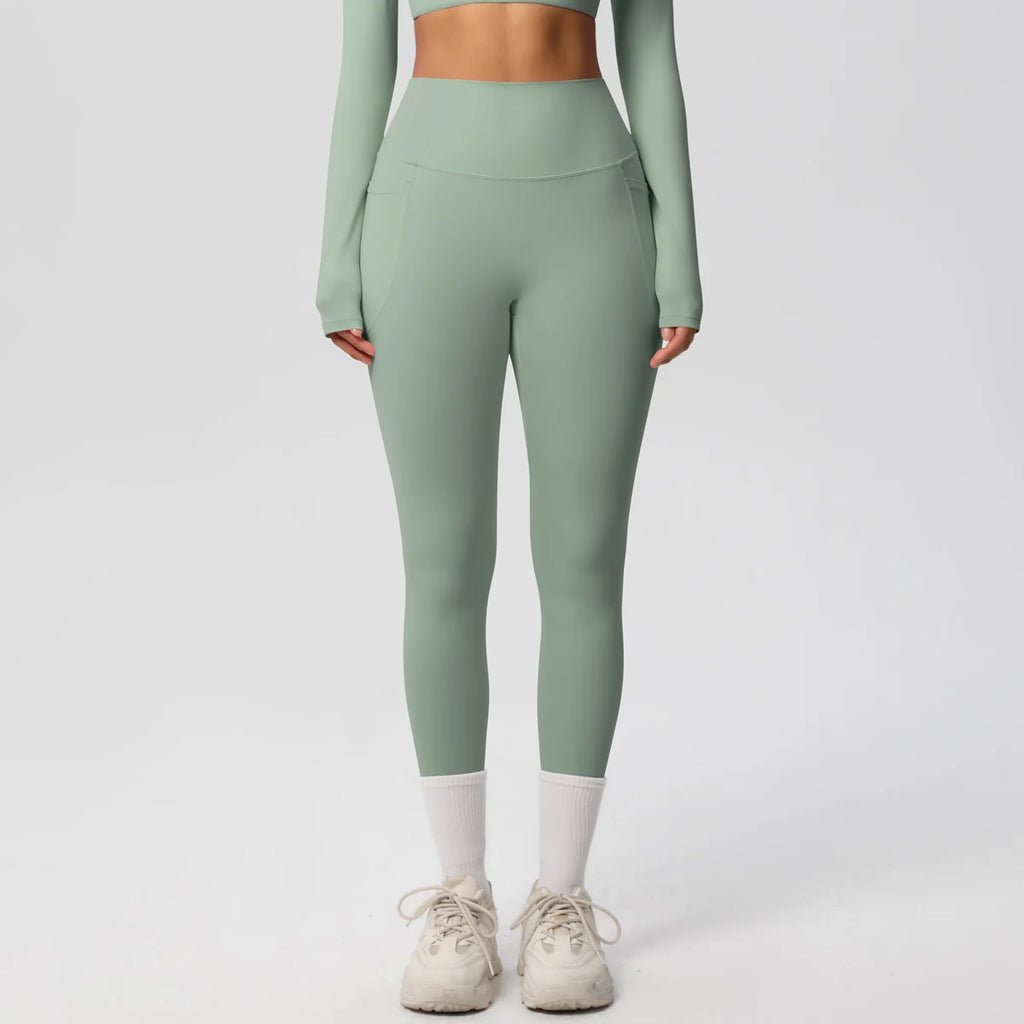 Xooie Fit high intensity pocket leggings in green for workout and exercise with practical side pockets