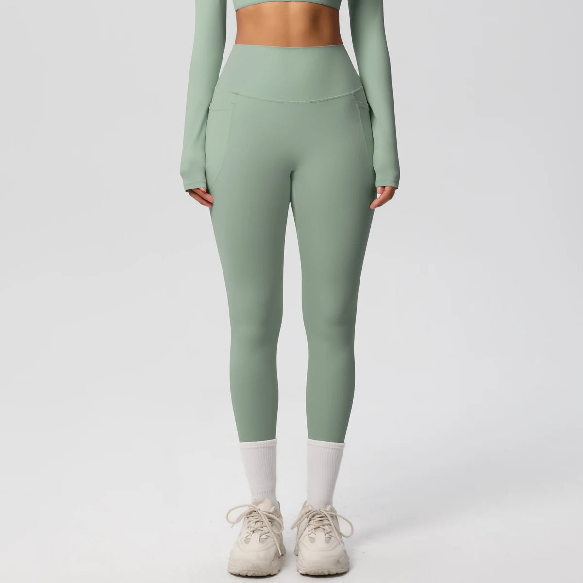 Xooie Fit high intensity pocket leggings in green for workout and exercise with practical side pockets