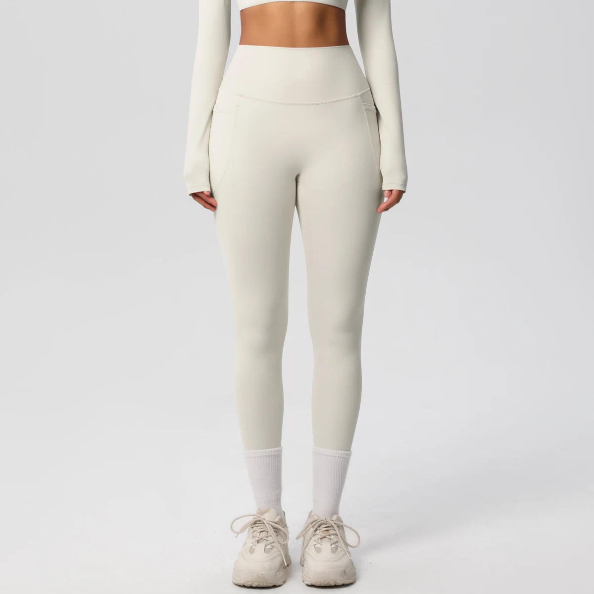 Xooie Fit high intensity pocket leggings in light beige with a sleek, high-waisted design for comfort and style