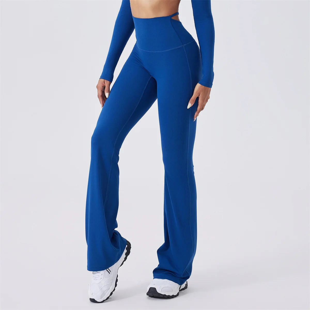 X-Back flared high-waist active pants in blue, close-up of flare
