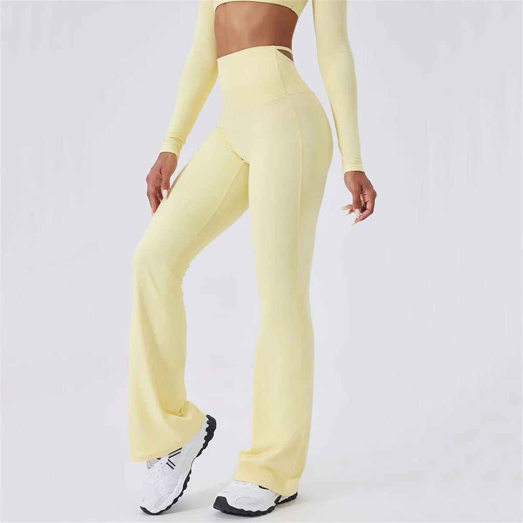 X-Back flared high-waist active pants in pale yellow, side view