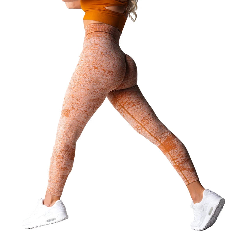 Xooie Fit high waisted seamless leggings in textured orange, perfect for workouts and everyday wear