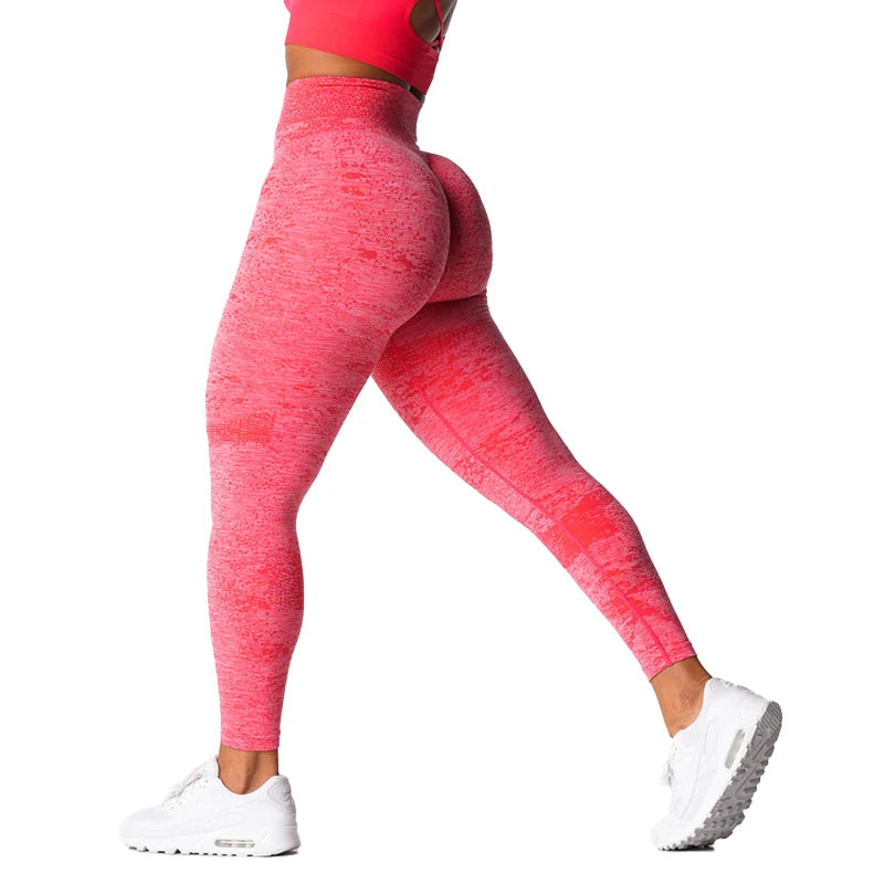 Xooie Fit high waisted seamless leggings in vibrant pink for comfortable and stylish workouts