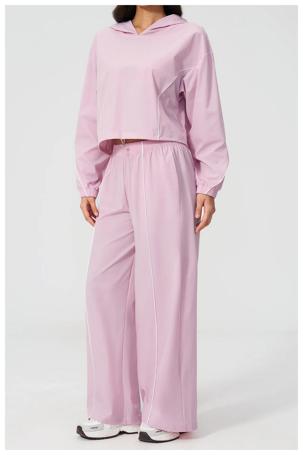 Women’s hooded zip sports set with long sleeves and wide-leg pants, pale pink