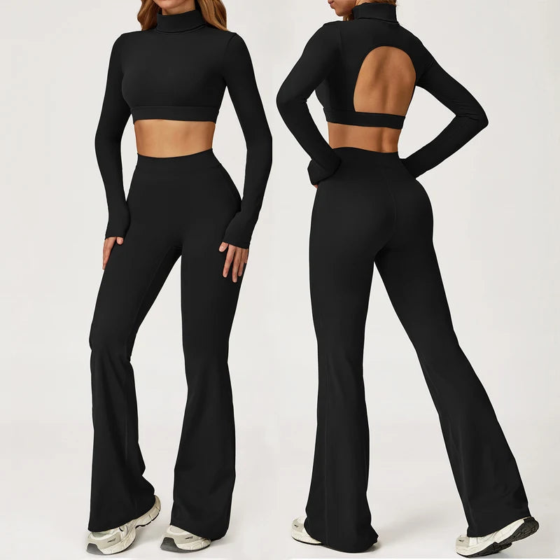 Xooie Fit long sleeve backless top and flare pants set in black, featuring a stylish cutout back design