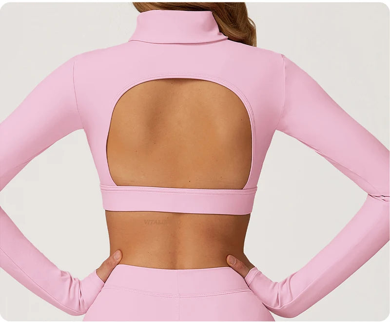 Xooie Fit long sleeve backless top and flare pants set in pink showcasing stylish open back design