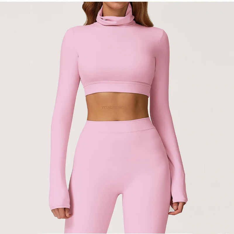 Xooie Fit long sleeve backless top and flare pants set in pink, perfect for stylish casual wear.
