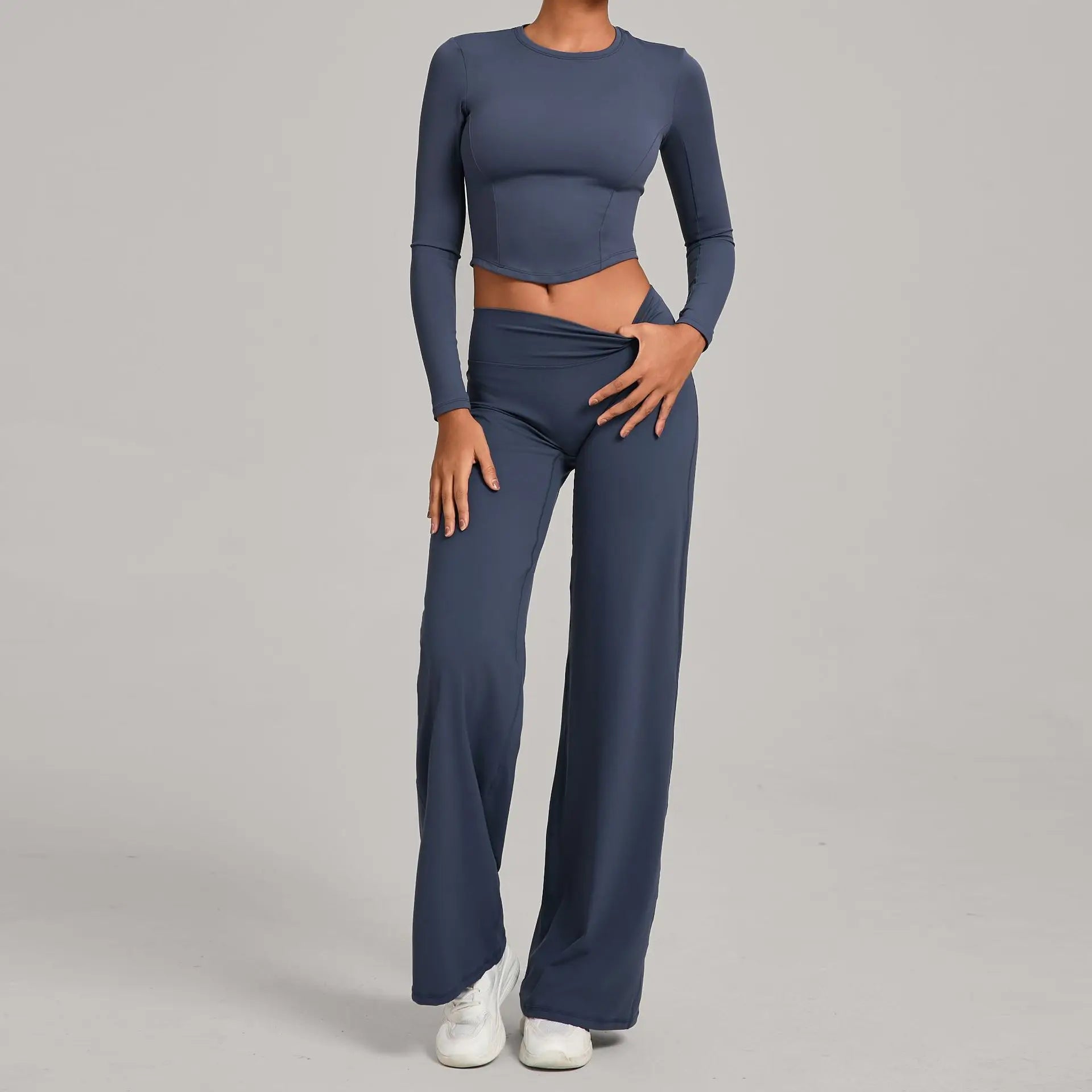 Xooie Fit long sleeve crop top and flared pants outfit in dark color, perfect for casual wear