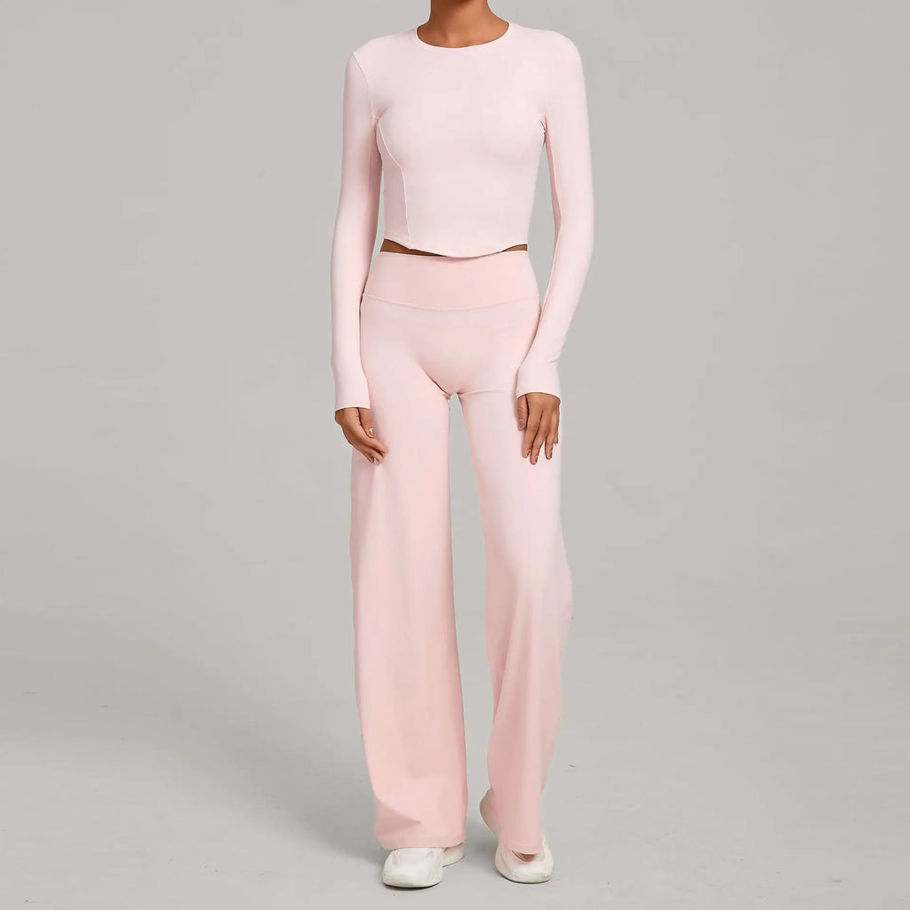 Xooie Fit long sleeve crop top and flared pants outfit in soft pink for a chic, comfortable look