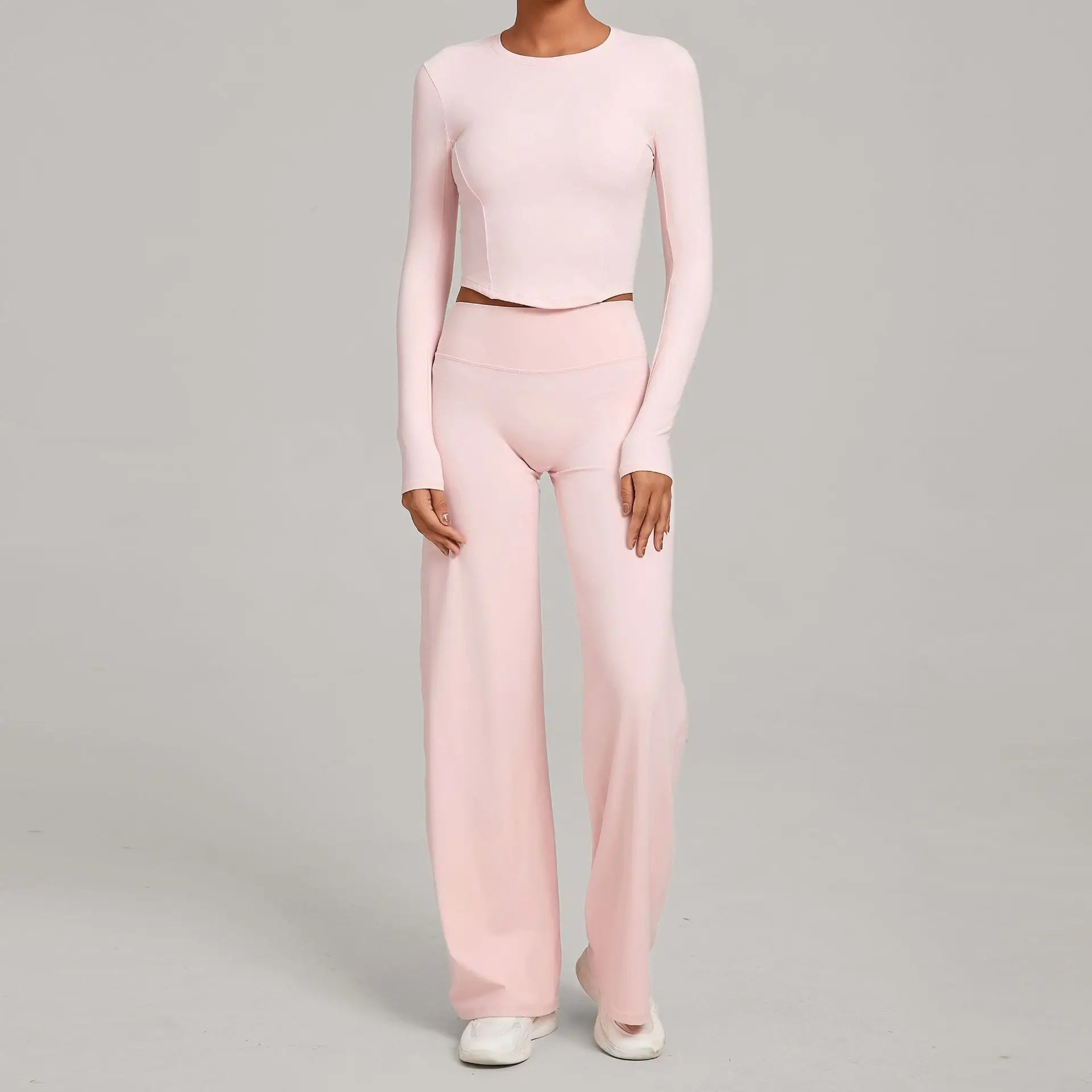 Xooie Fit long sleeve crop top and flared pants outfit in soft pink for a chic, comfortable look
