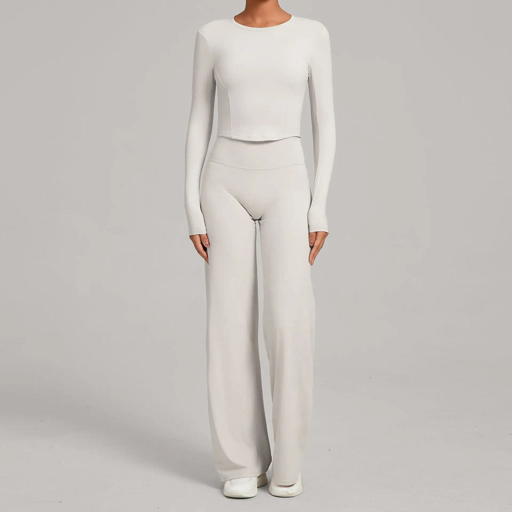 Xooie Fit long sleeve crop top and flared pants outfit in light gray, perfect for casual and stylish wear