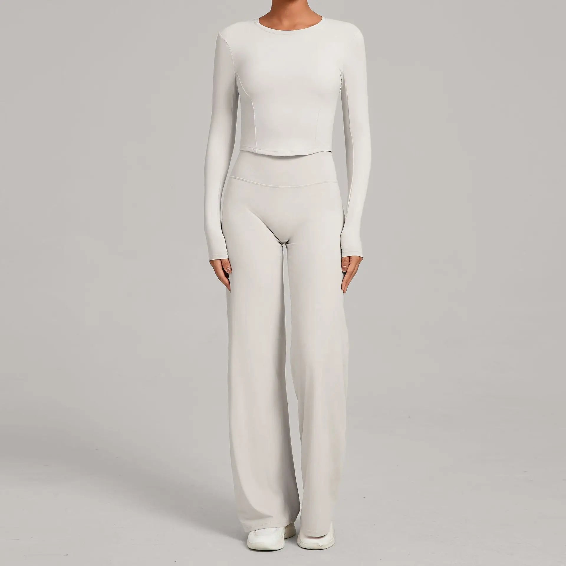 Xooie Fit long sleeve crop top and flared pants outfit in light gray, perfect for casual and stylish wear