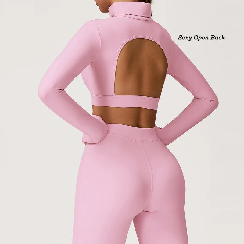 Pink long sleeve crop top and shorts set with a sexy open back for stylish athleisure wear