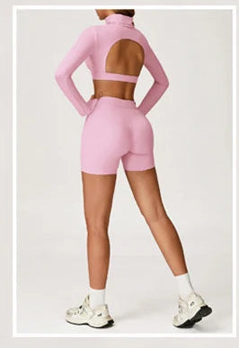 Xooie Fit long sleeve crop top and shorts set in pink with unique back cutout design