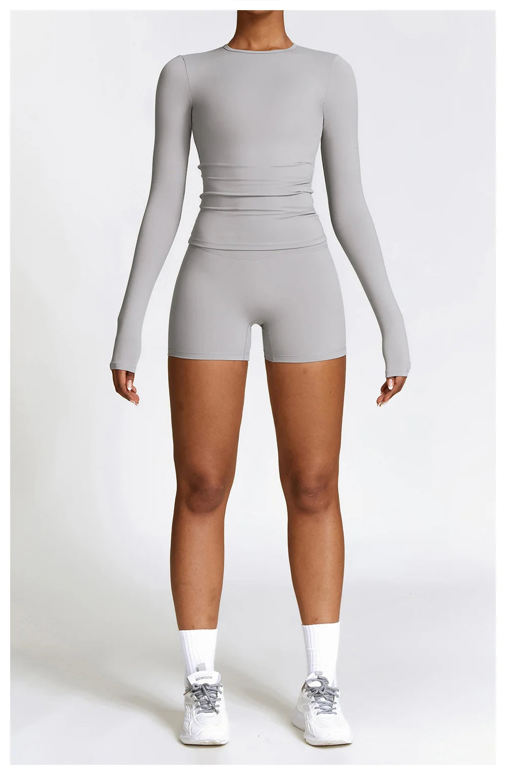 Xooie Fit long sleeve workout outfit in grey featuring a fitted top and matching shorts