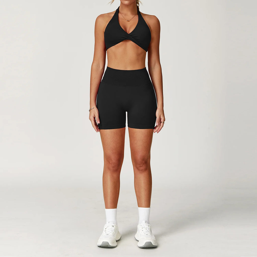 Stylish Xooie Fit two-piece set featuring a matching sports bra and shorts for gym workouts