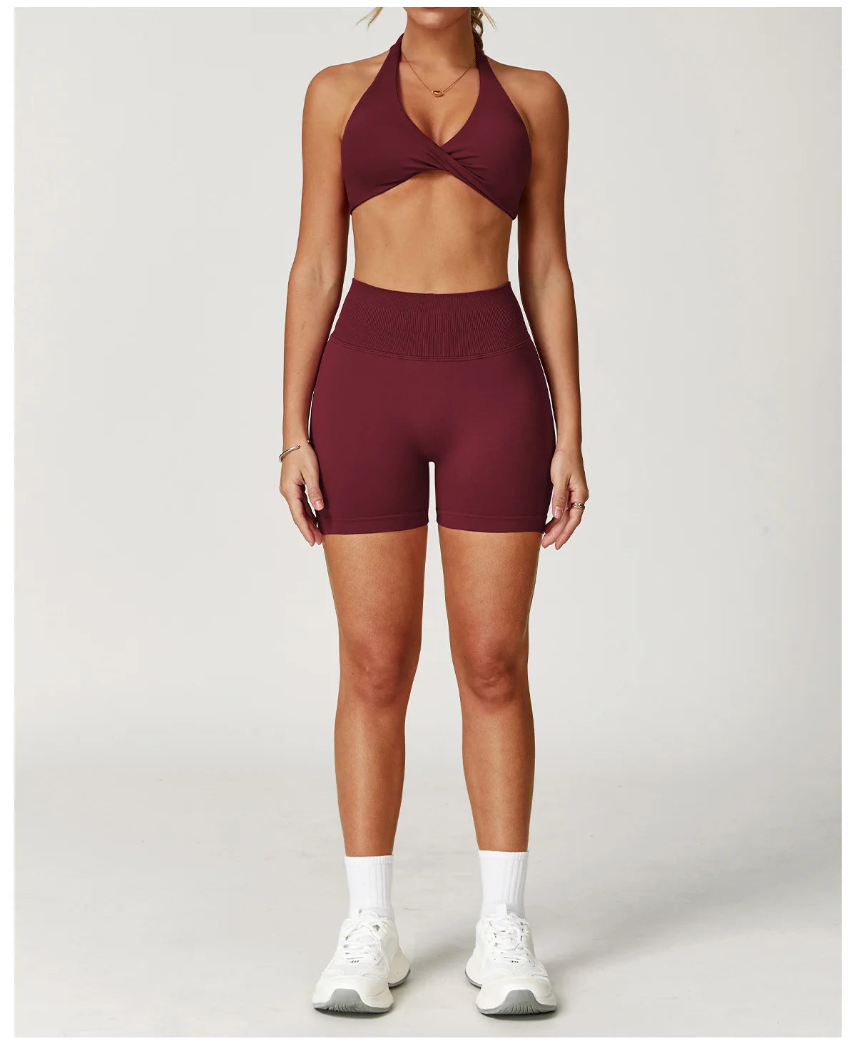 Xooie Fit Two-Piece Set featuring matching sports bra and shorts for gym in a rich burgundy color