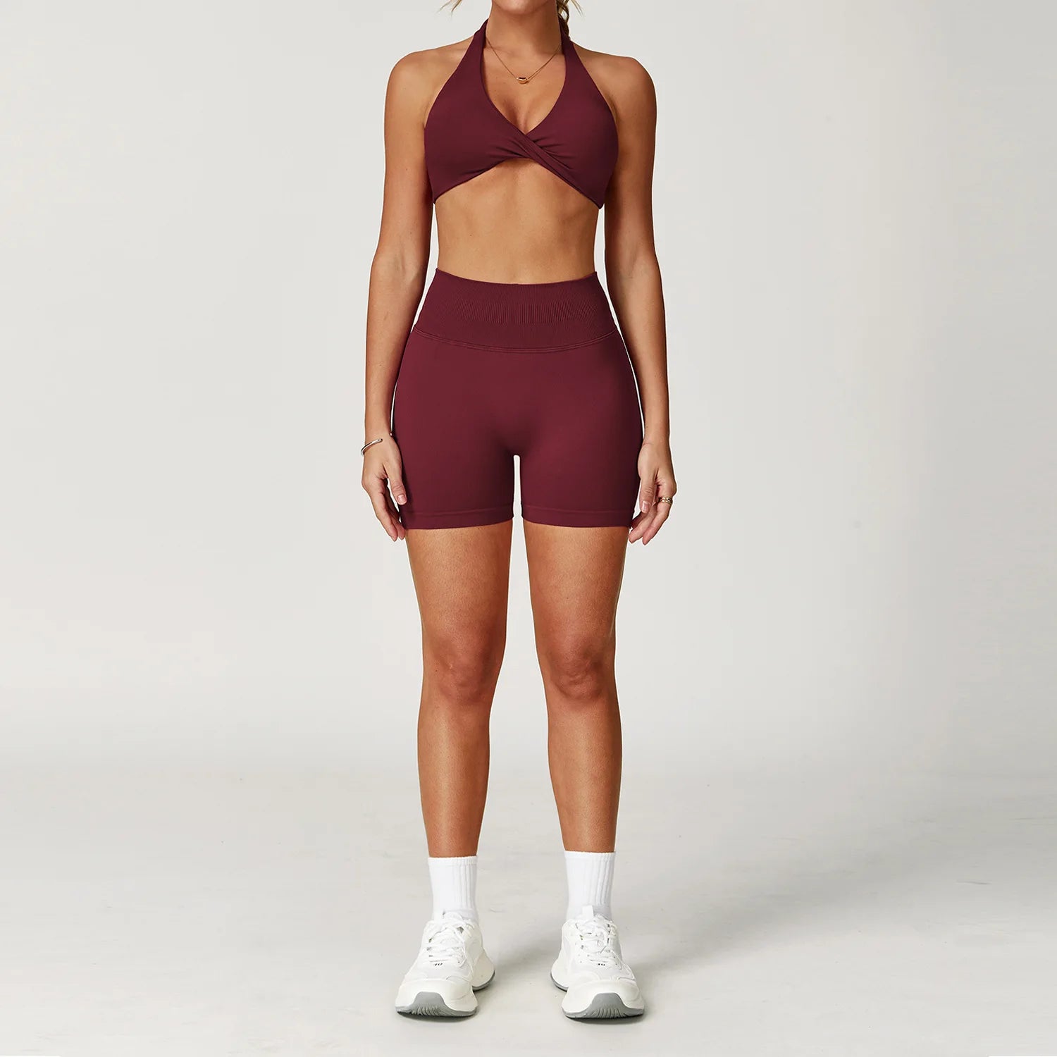 Xooie Fit Two-Piece Set featuring a halter sports bra and high-waisted shorts, perfect matching sports bra and shorts for gym