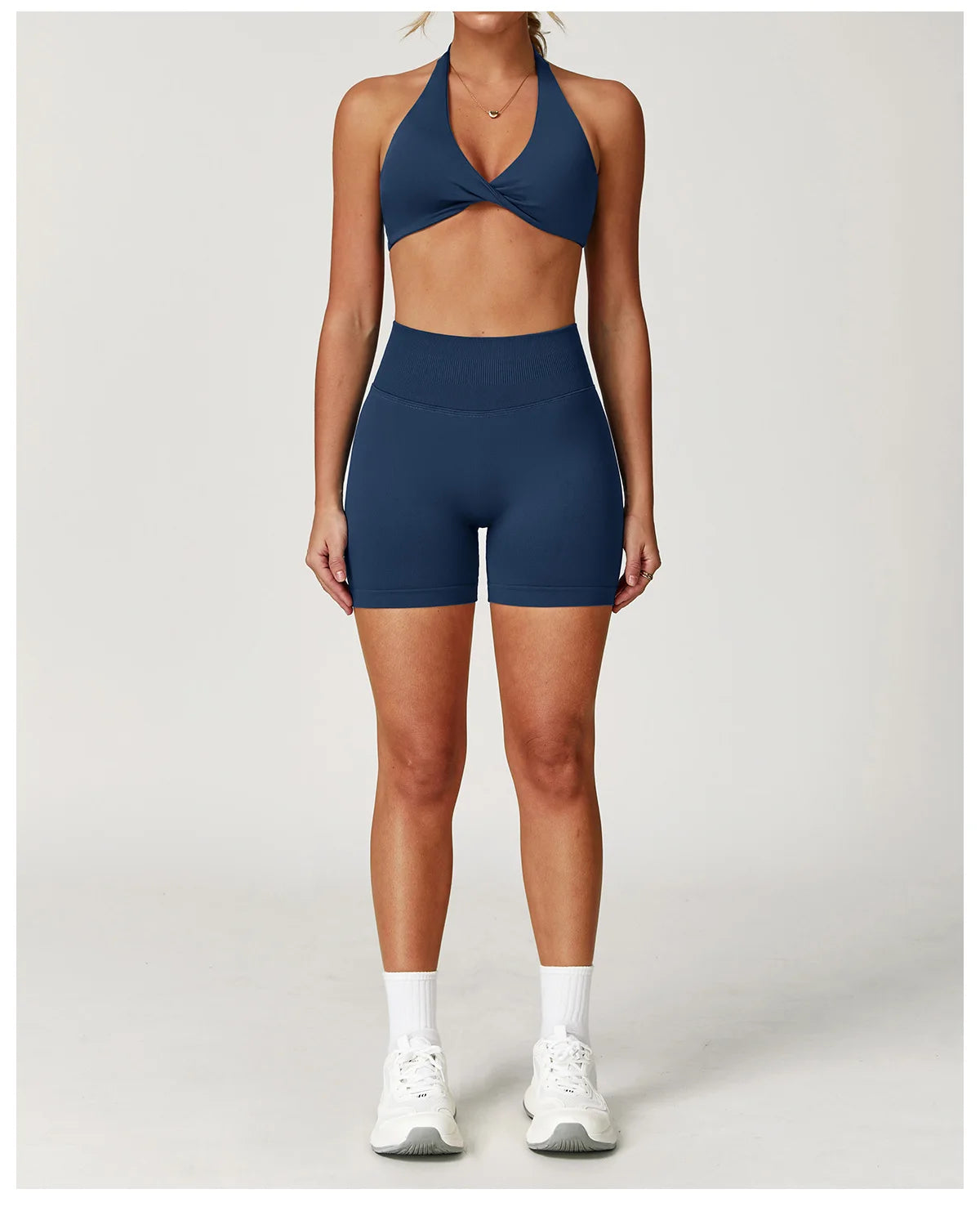 Xooie Fit Two-Piece Set featuring a matching sports bra and shorts for gym in dark blue