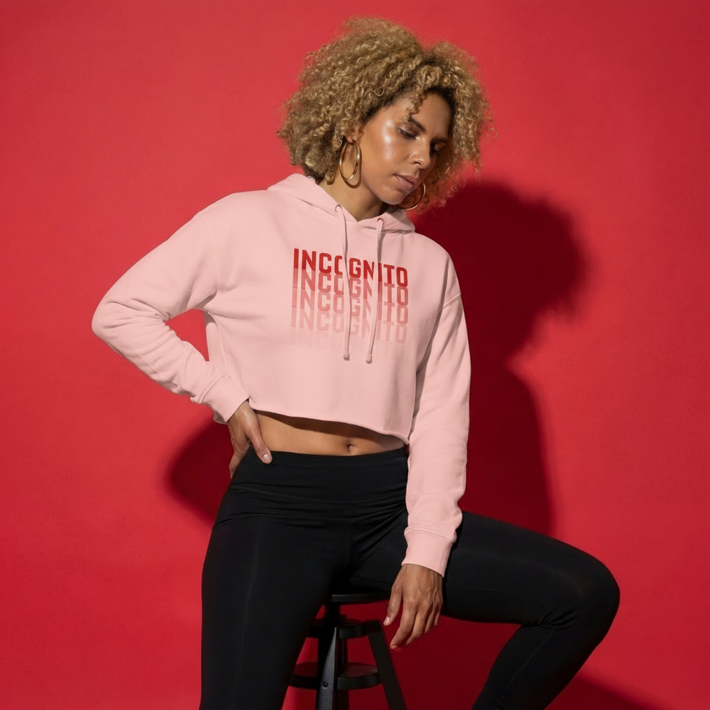 Light pink cropped active hoodie, back view with hood and drawstrings, “INCognito” print