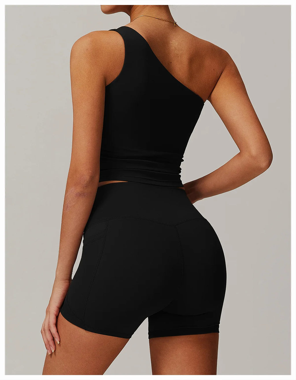 Xooie Fit One Shoulder Workout Top in Black, stylish design perfect for gym and fitness activities