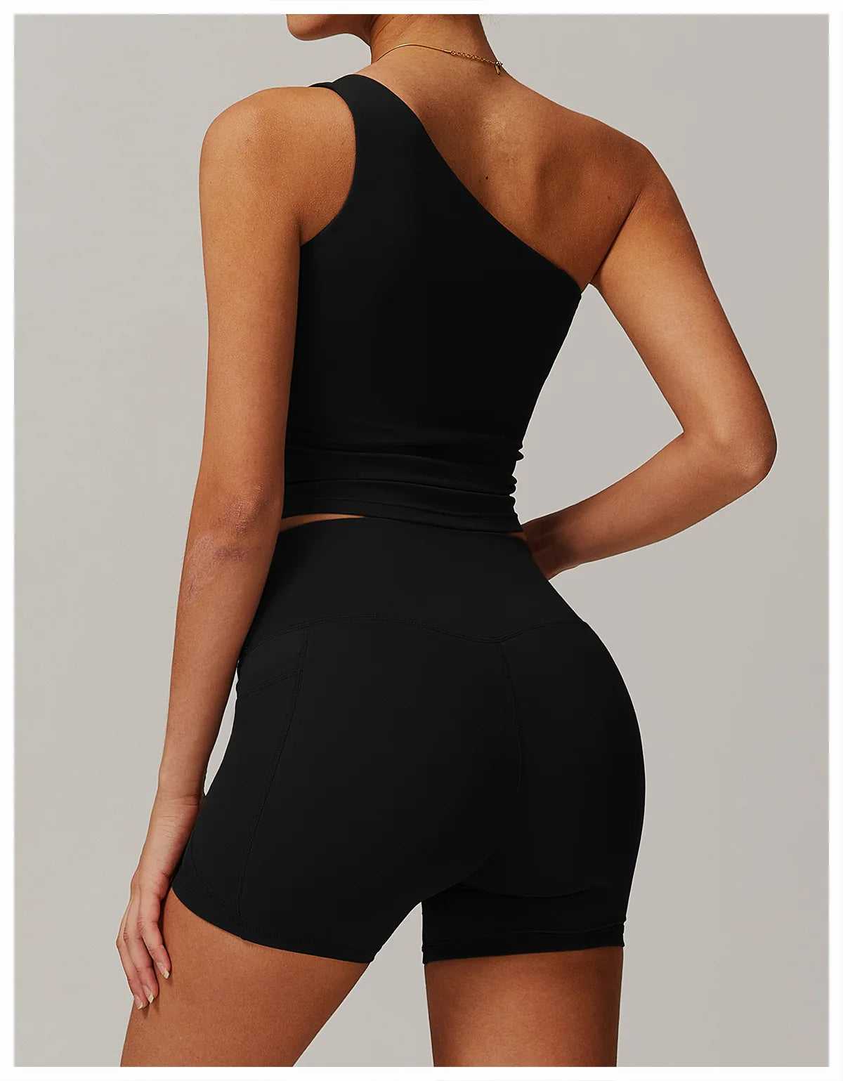 Xooie Fit One Shoulder Workout Top in Black, stylish design perfect for gym and fitness activities