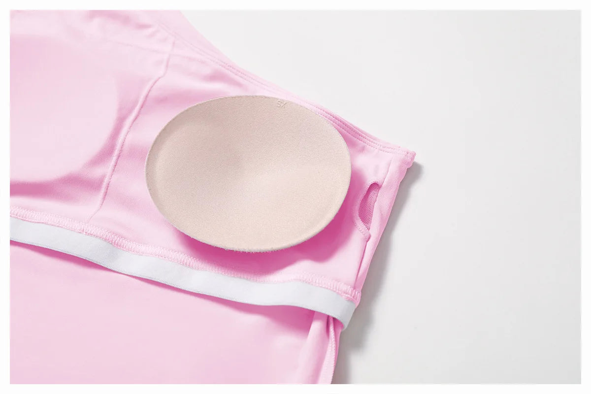 Xooie Fit One Shoulder Workout Top in Pink with Removable Padding for Comfort and Support