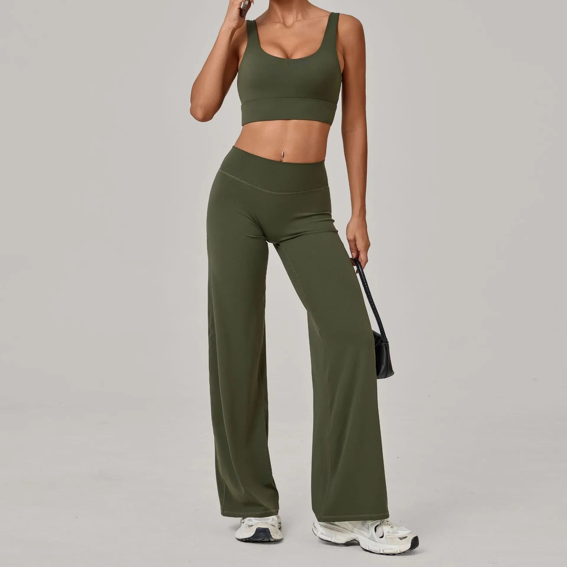 Xooie Fit open back crop top and flare pants set in olive green for stylish comfort