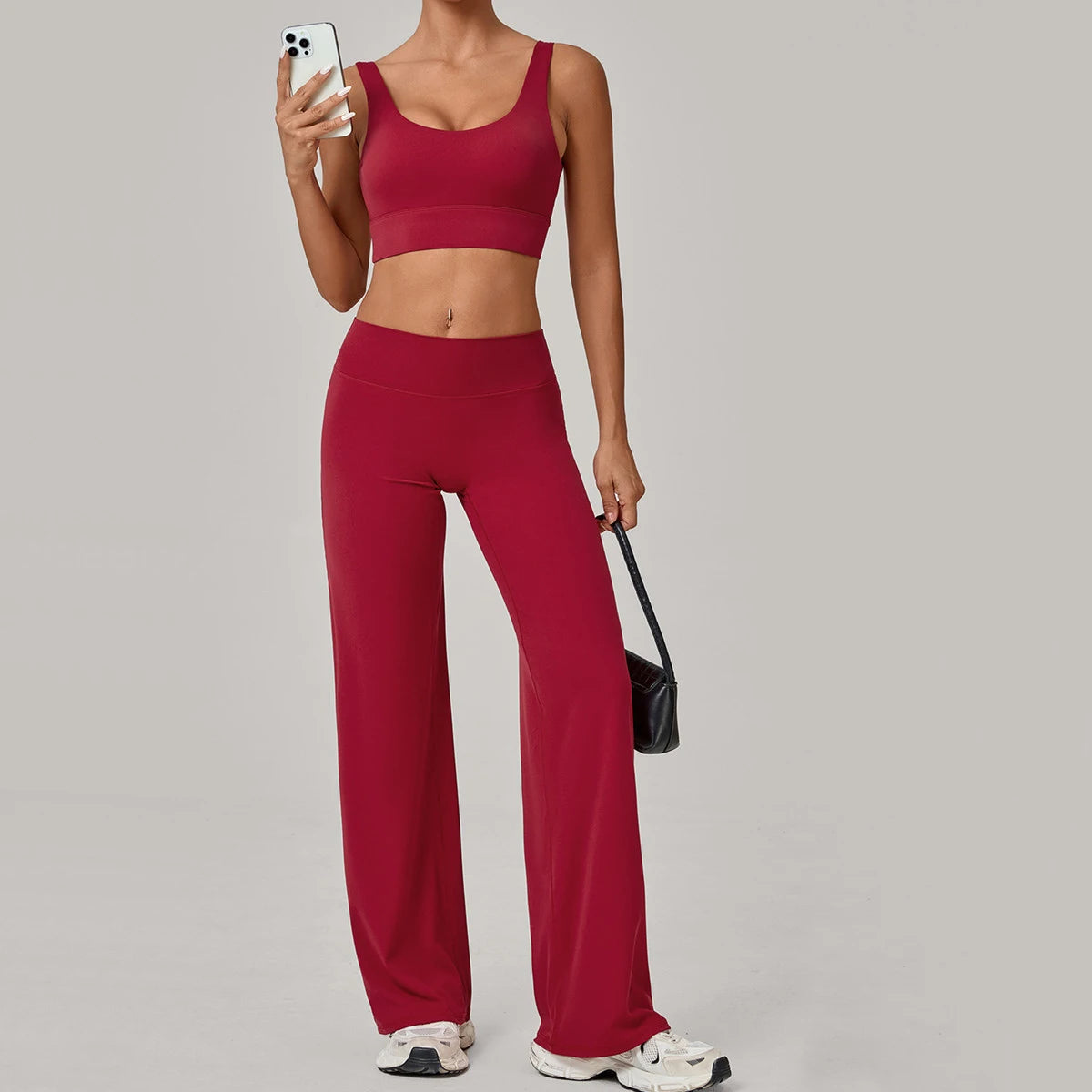 Xooie Fit open back crop top and flare pants set in burgundy perfect for casual outings and workouts