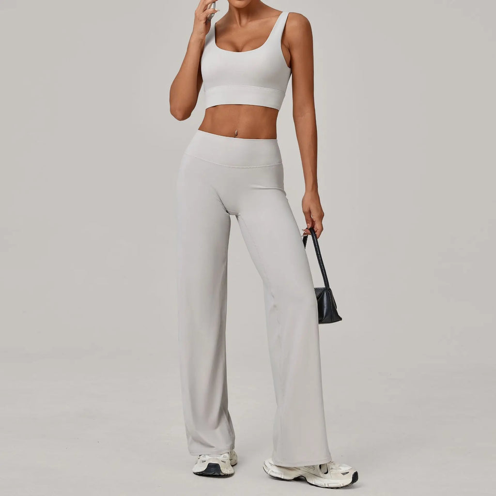 Xooie Fit open back crop top and flare pants set in light gray for a stylish casual look