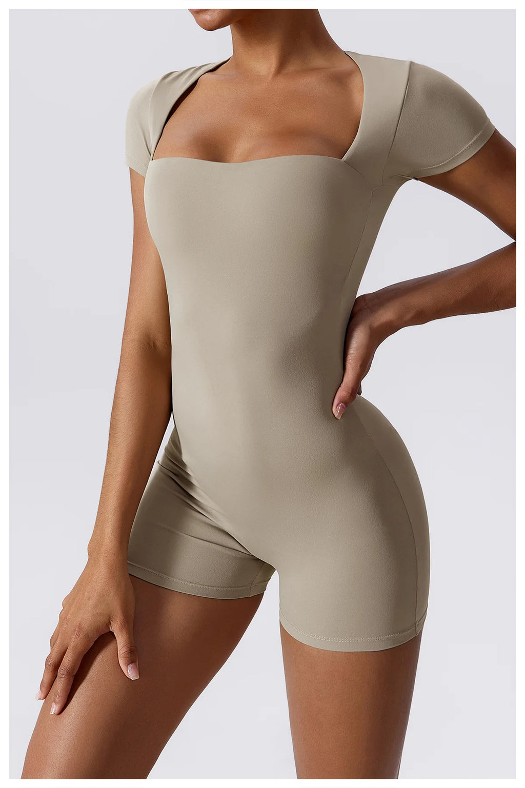 Beige short-sleeve one-piece yoga suit with square neckline and shaped torso