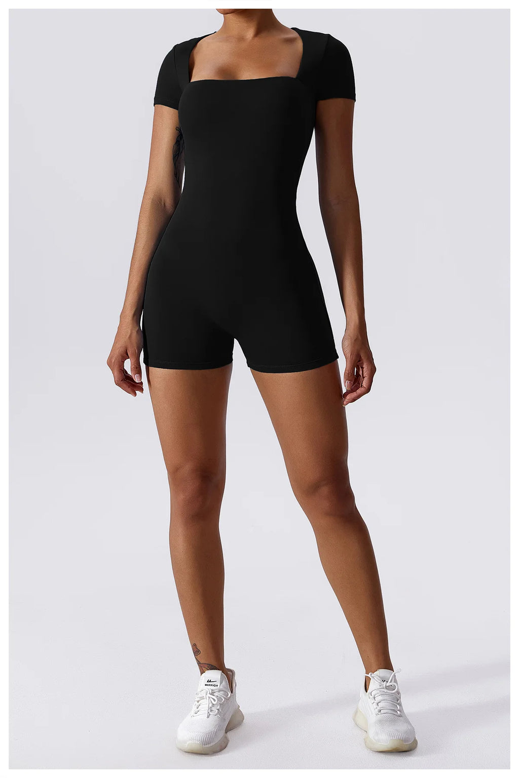 Women's black short one-piece yoga suit with square neckline and short legs