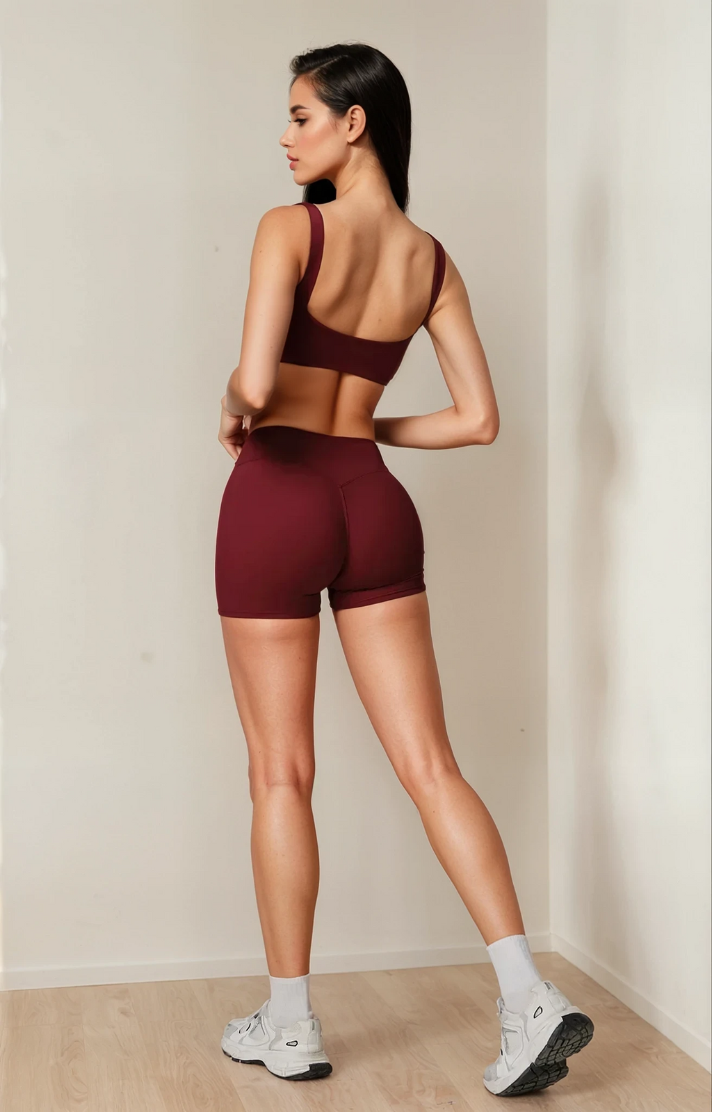 Xooie Fit burgundy sports bra and shorts set with a comfortable fit for workout enthusiasts