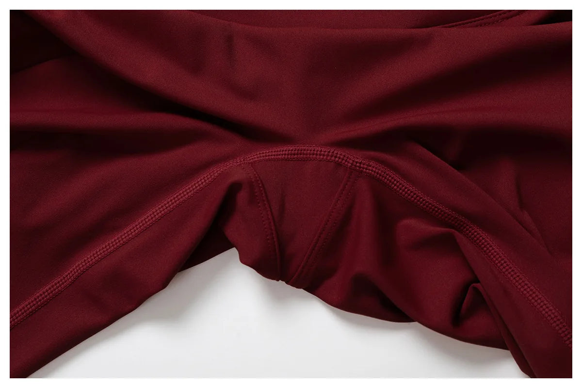 Maroon Xooie Fit sports bra and shorts set featuring soft, stretchy fabric for comfortable workouts