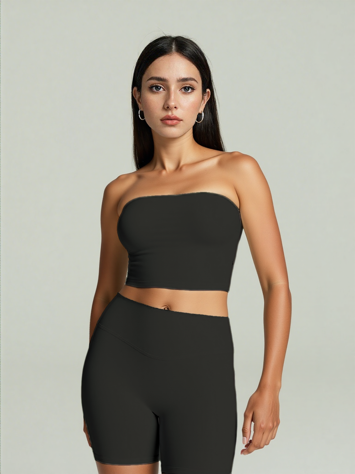 Black Xooie Fit strapless activewear set featuring a cropped top and matching shorts for yoga and workouts