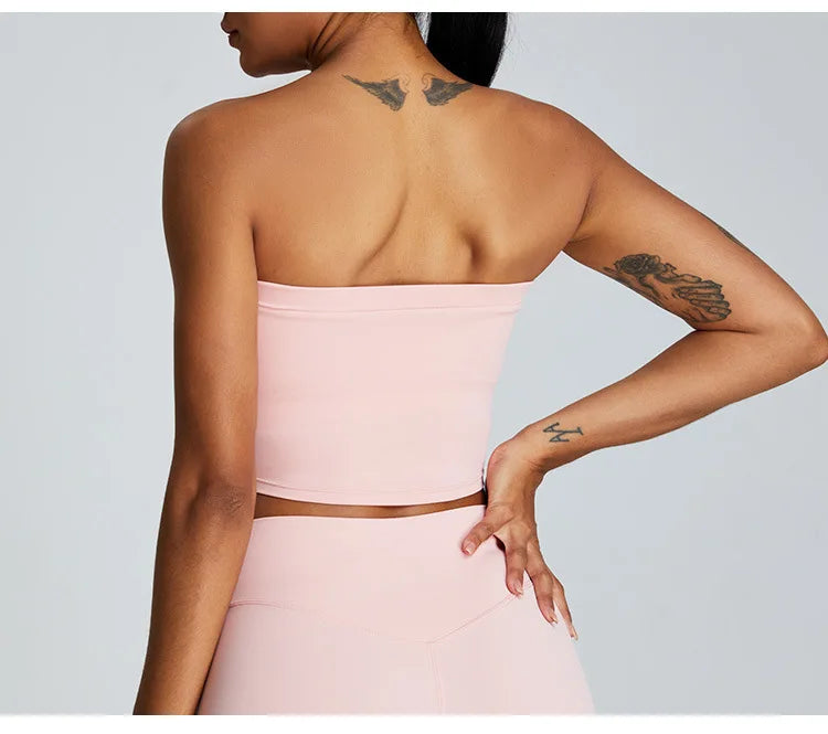 Women’s Xooie Fit strapless activewear set in pink featuring a stylish crop top and comfortable fit
