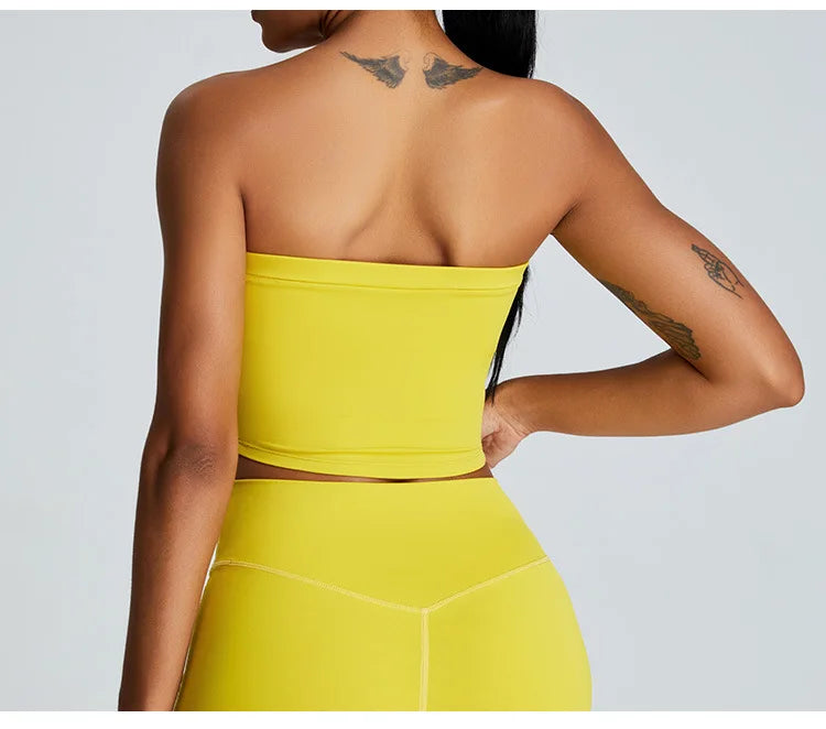 Xooie Fit strapless activewear set in vibrant yellow, showcasing a cropped top and high-waisted leggings