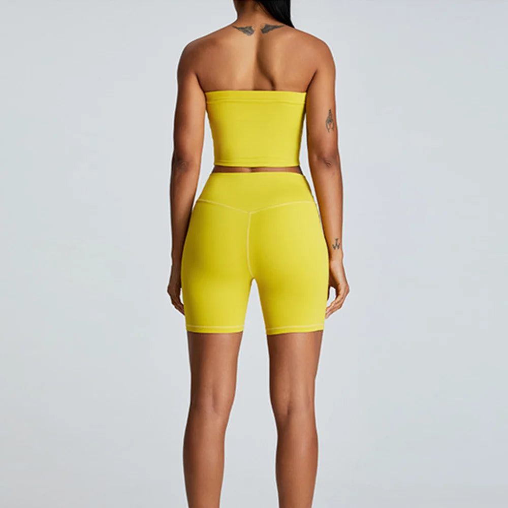 Xooie Fit strapless activewear set in vibrant yellow, featuring a cropped top and matching shorts